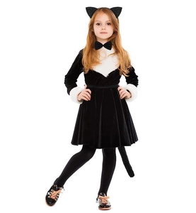 Detail of child black cat cosplay dress with white faux fur trim and velvet texture