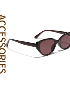 Detail view of cat-eye sunglasses featuring CE and UKCA marks on the inner temple