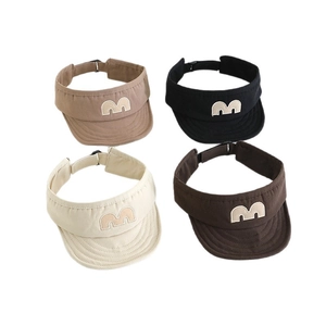 Four colorful kids sun visor hats with letter M embroidery for summer sun protection