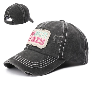 Faded dark gray baseball cap with Beach Crazy patch embroidery and distressed details