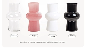 Set of four bubble-shaped glass vases in clear, pink, white, and black for home decor