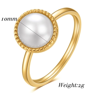 Detail shot of a 10mm white pearl on a gold stainless steel ring weighing 2 grams