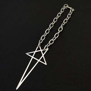 Punk style silver star pendant necklace with durable metal chain on black background