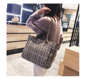 Tweed tote bag with leather handles and chain strap shown in a daily commute scene