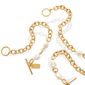 Golden OT clasp bracelet with freshwater pearls and handmade rectangular tag charm
