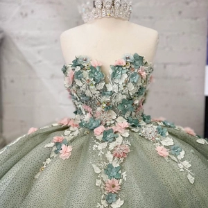 Elegant sage green strapless ball gown with 3D floral appliques and shimmering tulle skirt