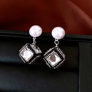 French vintage earrings with white pearls and geometric cubic pendants in silver