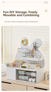 Detail of white rabbit pegboard desk organizer with transparent drawers and hooks