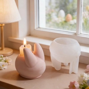 Easter rabbit silicone mold for DIY candle making with finished pink bunny candle
