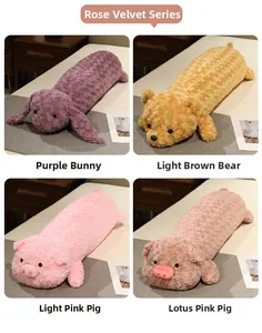 Detail of rose velvet plush pillows in animal shapes including rabbit, bear and pig