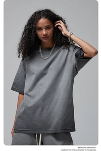 Detail of gray washed cotton oversized t-shirt and drawstring shorts with knit texture