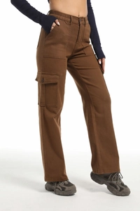 Detail of high-waist brown cargo pants showing large flap pockets and straight-leg cut