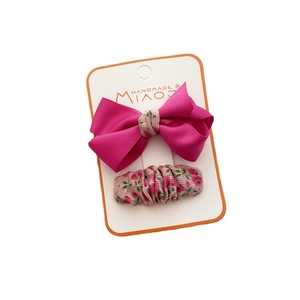 Two-piece set of girls' rose pink floral fabric bow hair clips on handmade card