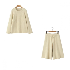 Women's cream white knit two-piece set featuring a crewneck sweater and drawstring shorts