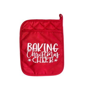 Red Christmas pot holder with quilted diamond pattern and Baking Christmas Cheer print