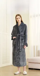 Detail showing plush grey flannel bathrobe with quilted collar and large side pockets