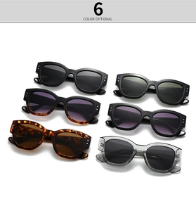Collection of narrow oval sunglasses in six colors including marble and black finishes