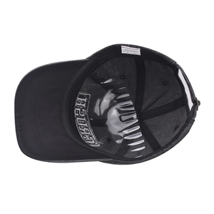 Detail of 100% cotton washed baseball cap interior with sweatband and embroidery