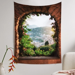 Scenic Mediterranean landscape tapestry with archway and floral detail hanging on white wall