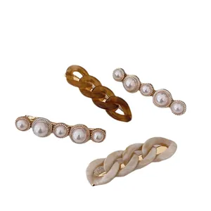 Ins style hair clip set with pearls and acrylic chain links in amber and cream
