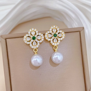 Golden clover earrings with white zircon, green gemstone and large hanging white pearls
