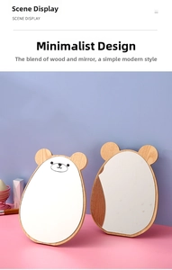 Detail of cute bear-shaped wooden tabletop mirrors with natural wood frames for vanity