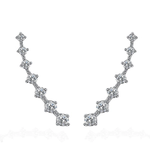 Macro detail of elegant silver ear climbers with a row of seven sparkling round zircons
