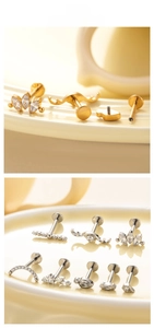 Macro detail of G23 titanium labret studs showing internal thread and zircon stone settings