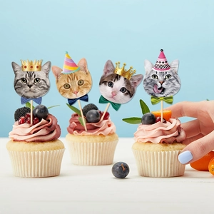 Cat theme birthday cupcake toppers with adorable feline faces for party cake decorations