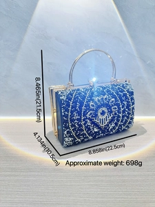 Navy luxury rhinestone evening clutch bag with gold round handle and circular crystal pattern