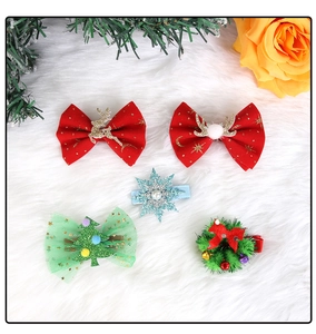 Detailed set of 5 Christmas hair clips with reindeer, snowflakes and trees on white fur