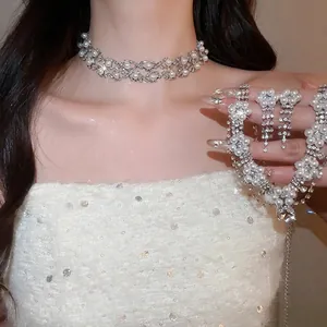 Elegant pearl and rhinestone jewelry set with multi-layer choker and tassel earrings