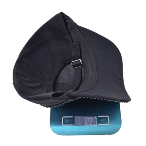 Detail view of adjustable strap and metal buckle on black sequin cap weighing 122g