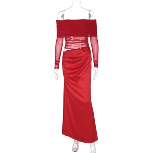 Detail of red off-shoulder dress featuring sheer mesh sleeves and waist cut-out design