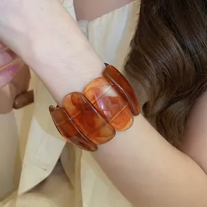 Vintage acrylic amber resin bangle with a wide elastic design for a stylish women look