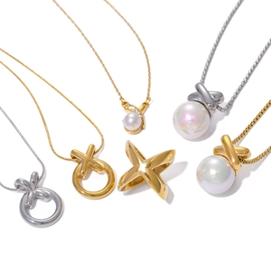 18k gold plated stainless steel necklace featuring X-shaped pendants and pearls
