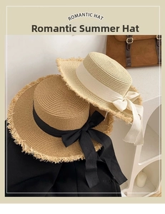 Detail of straw hats with chic bow ribbons and frayed edges in a warm aesthetic setting