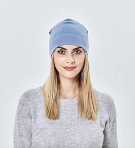 Front view of light blue knitted beanie hat showing soft texture and snug fit