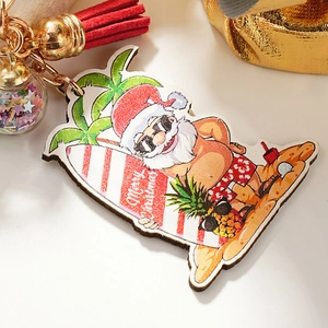 Christmas Santa surfing keychain with red tassel and starry glass ball charm