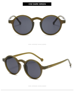 Detail view of round vintage dark green sunglasses with silver stud accents and polarized lenses