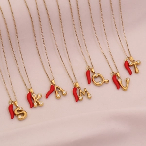 Golden stainless steel initial necklace with crystal letter and red chili pepper pendant