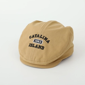 Close-up of khaki newsboy cap featuring 1983 Catalina Island embroidery detail