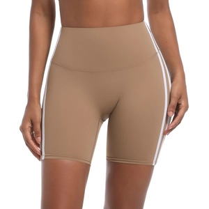 Detail of khaki high-waisted yoga shorts with side double white stripes and breathable fabric