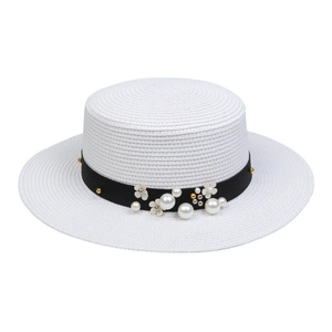 Elegant white flat top straw sun hat for women featuring black ribbon with pearls and flowers