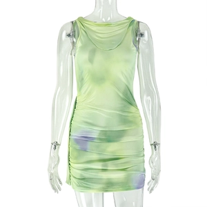 Detail of light green sleeveless dress with purple tie-dye print and pleated texture
