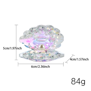 Detailed view of AB crystal shell figurine with dimensions 5x6x4cm and pearl inside