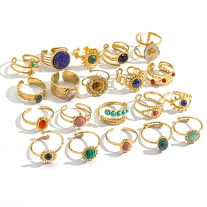 Set of 14K gold plated stainless steel rings with colorful natural stones and boho symbols