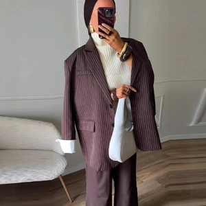 Women's brown striped oversized blazer with classic lapels and casual two-button design