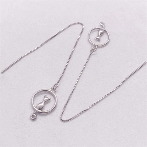 Macro detail of S925 sterling silver moon cat long chain tassel drop earrings