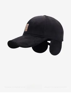 Detail view of winter baseball cap with thick warm fabric and fold-down ear protection